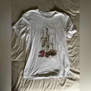 Woman’s graphic tee. Size small, slightly oversized fit.